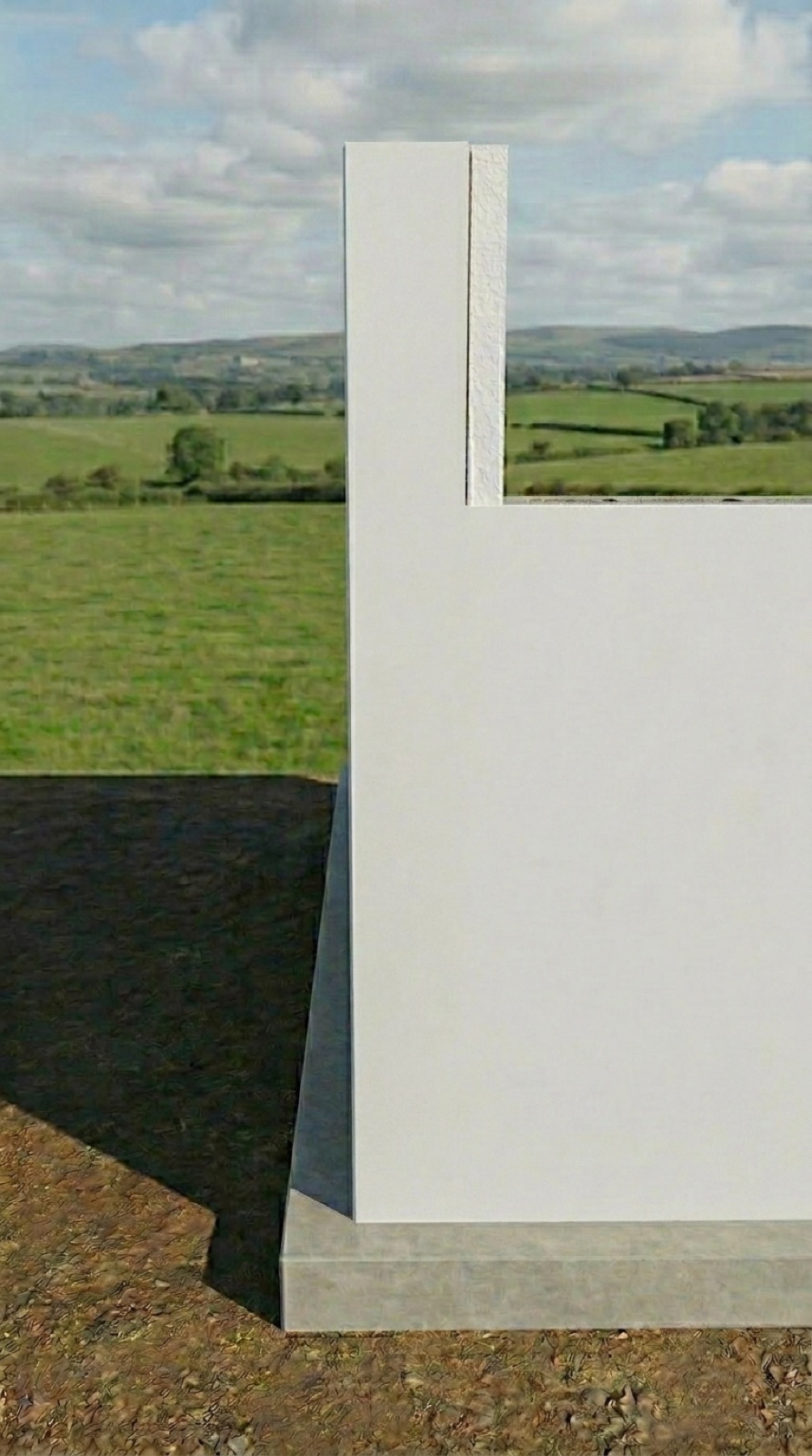 El mismo encuentro de muro de hormigón y fábrica de bloque ya enfoscado, con un acabado blanco liso y completamente intacto, sin ninguna grieta